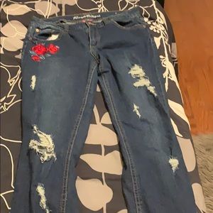 Mid rise ripped jeans.